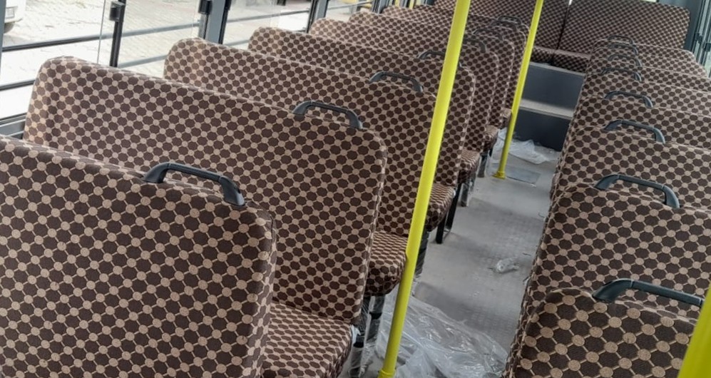 Bus seat covers fitted on standard simple bus seats